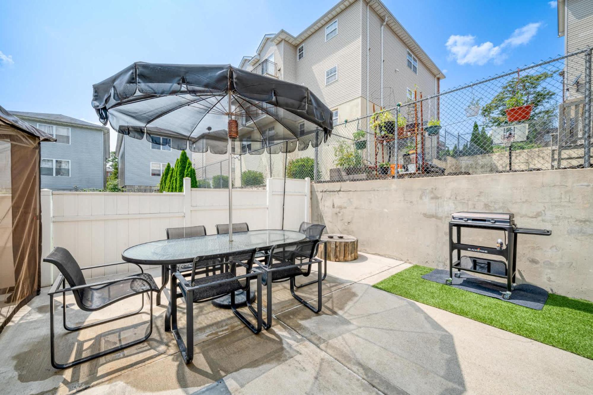 Newark Gem Ruby 3BR, 3BA - Sleeps 14 - Walk to Prudential Center and Newark Penn Station, Near EWR and American Dream Mall, includes Parking - WiFi - Laund view 3