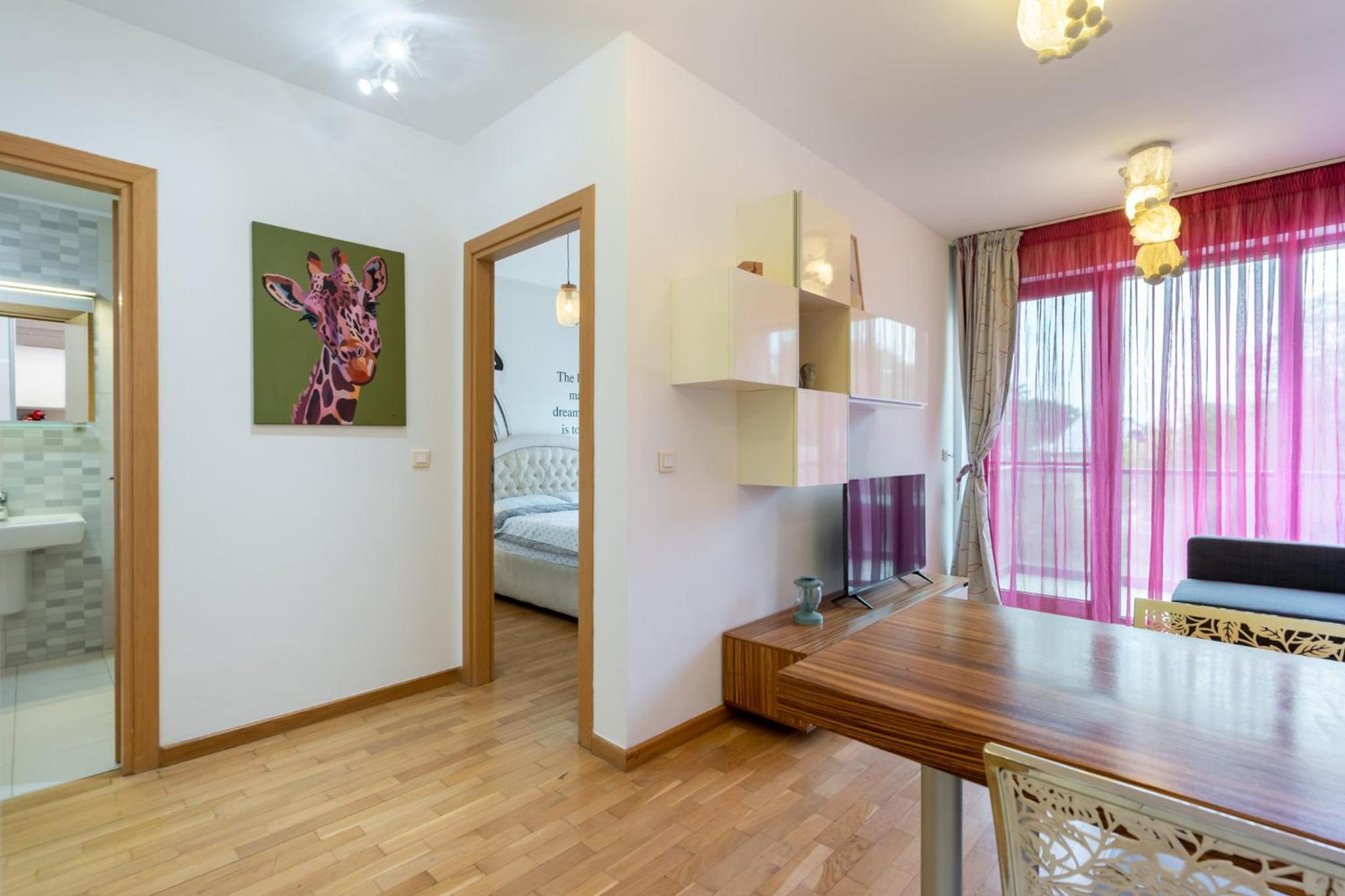 LazyNest - Modern Apartment with Parking & Balcony view 3