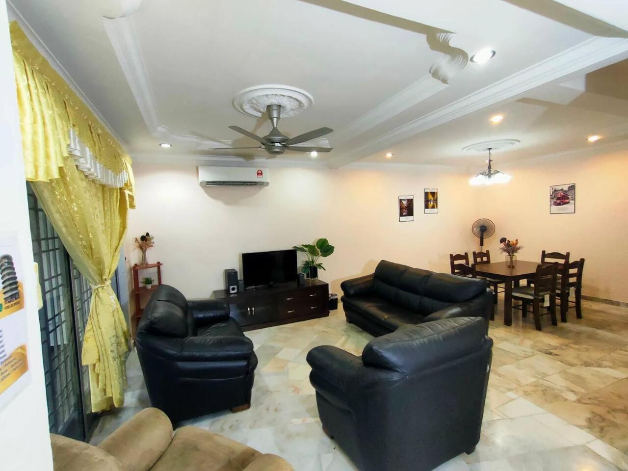 99 homestay teluk intan 5 min to Leaning Tower photo 1