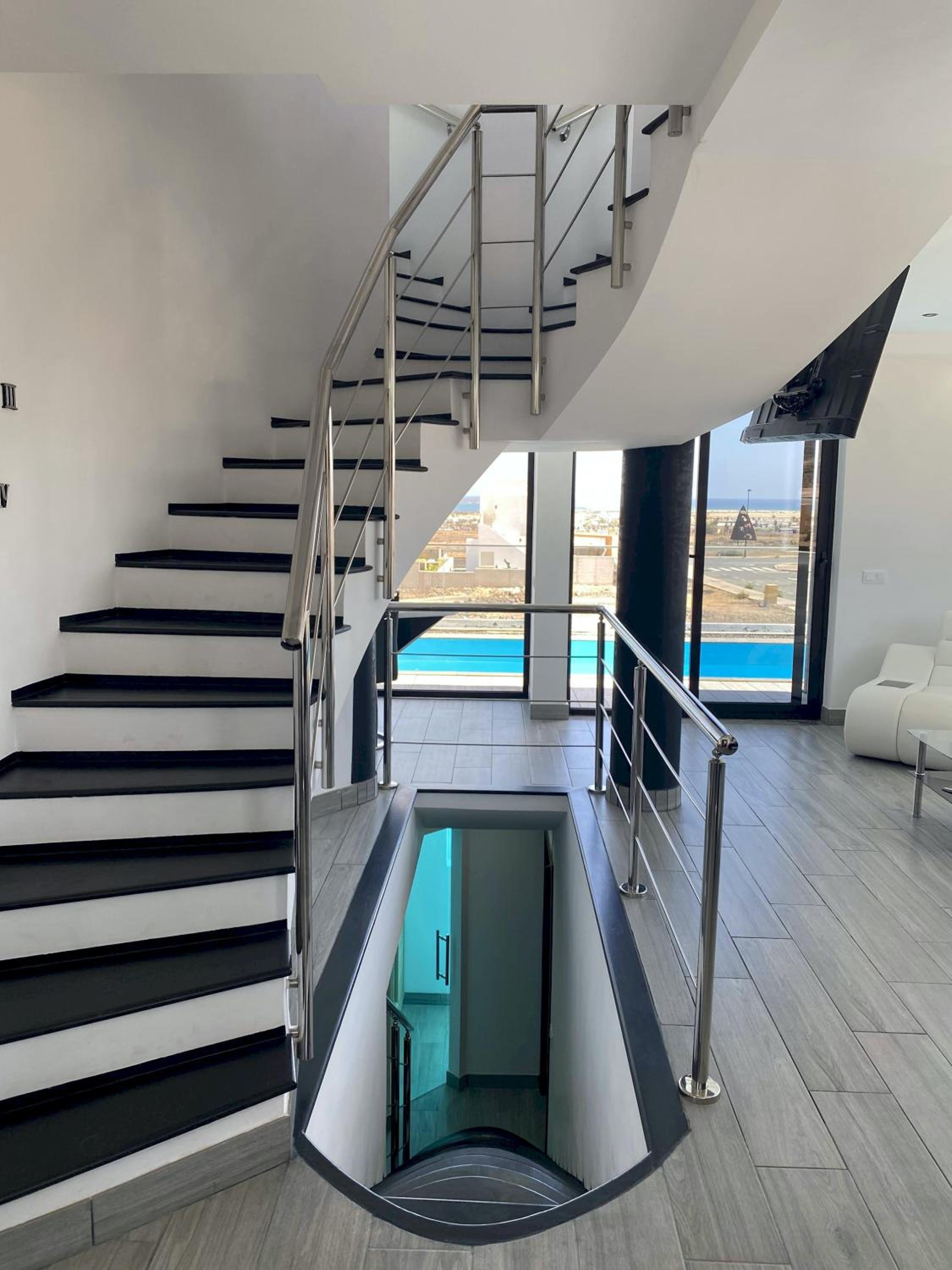 Villa Poseidon Corralejo with Private Heated Pool, Jacuzzi, Sauna and Stunning Volcano Views by Amazzzing Travel