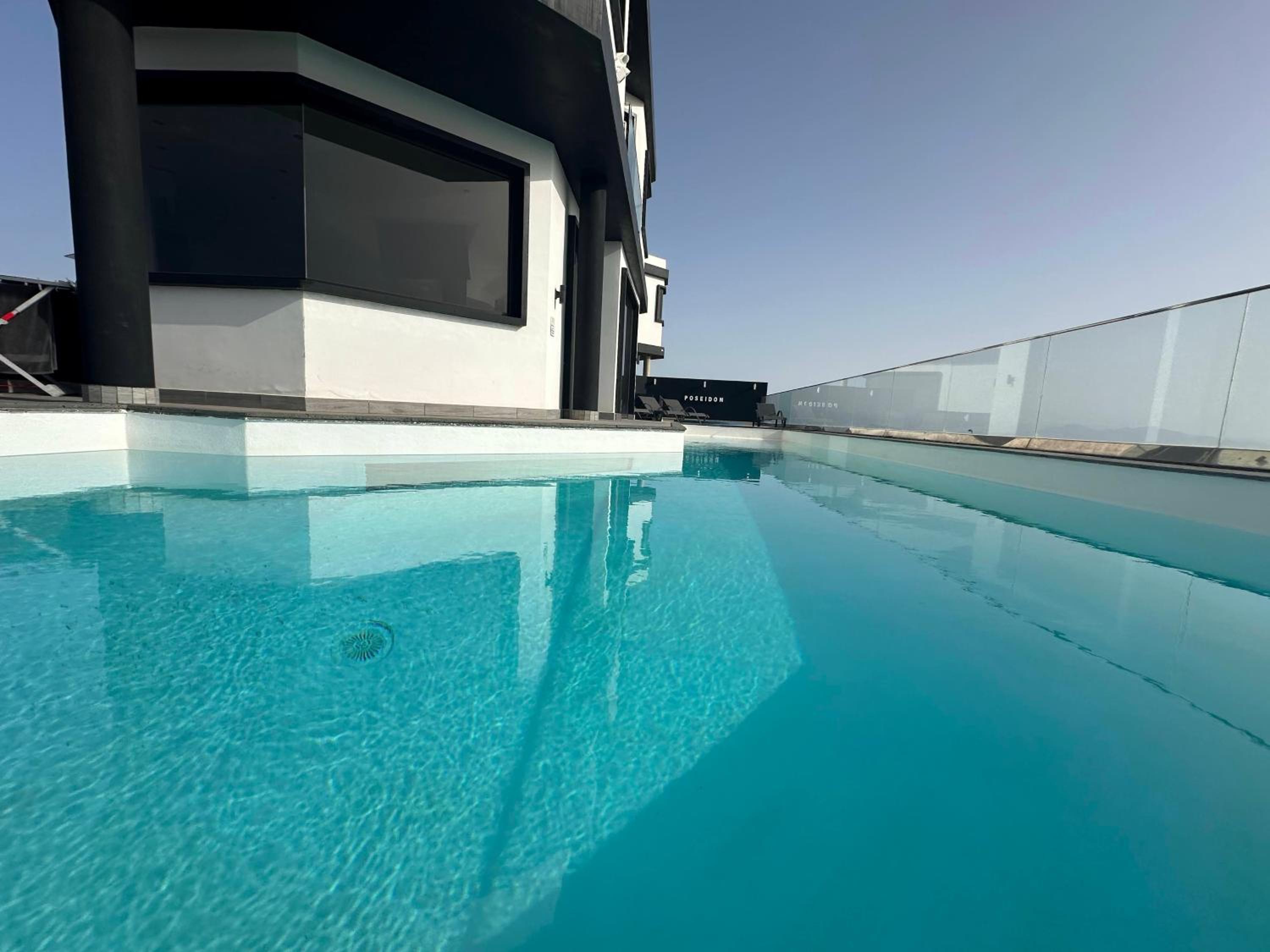 Villa Poseidon Corralejo with Private Heated Pool, Jacuzzi, Sauna and Stunning Volcano Views by Amazzzing Travel
