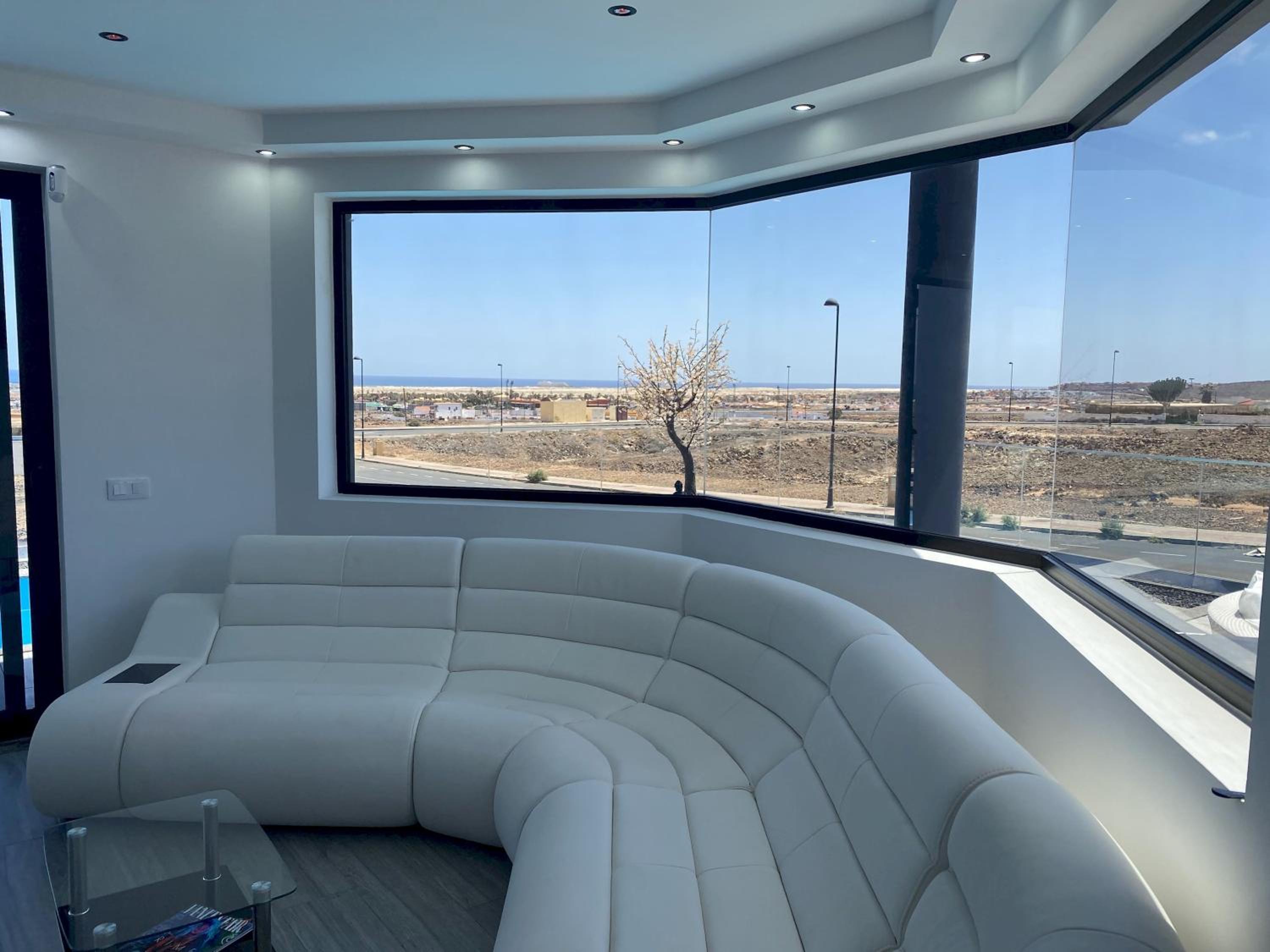 Villa Poseidon Corralejo with Private Heated Pool, Jacuzzi, Sauna and Stunning Volcano Views by Amazzzing Travel