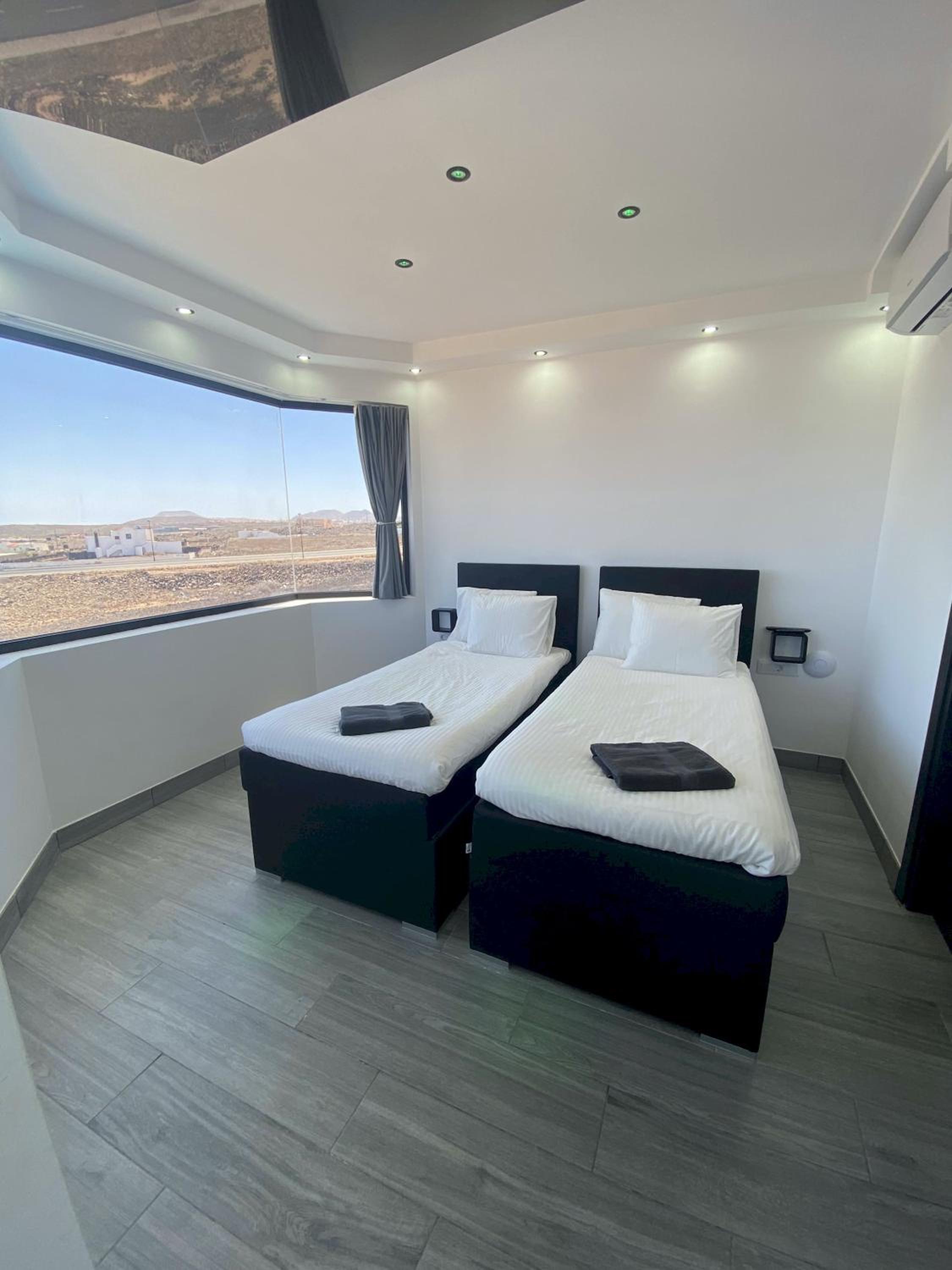 Villa Poseidon Corralejo with Private Heated Pool, Jacuzzi, Sauna and Stunning Volcano Views by Amazzzing Travel