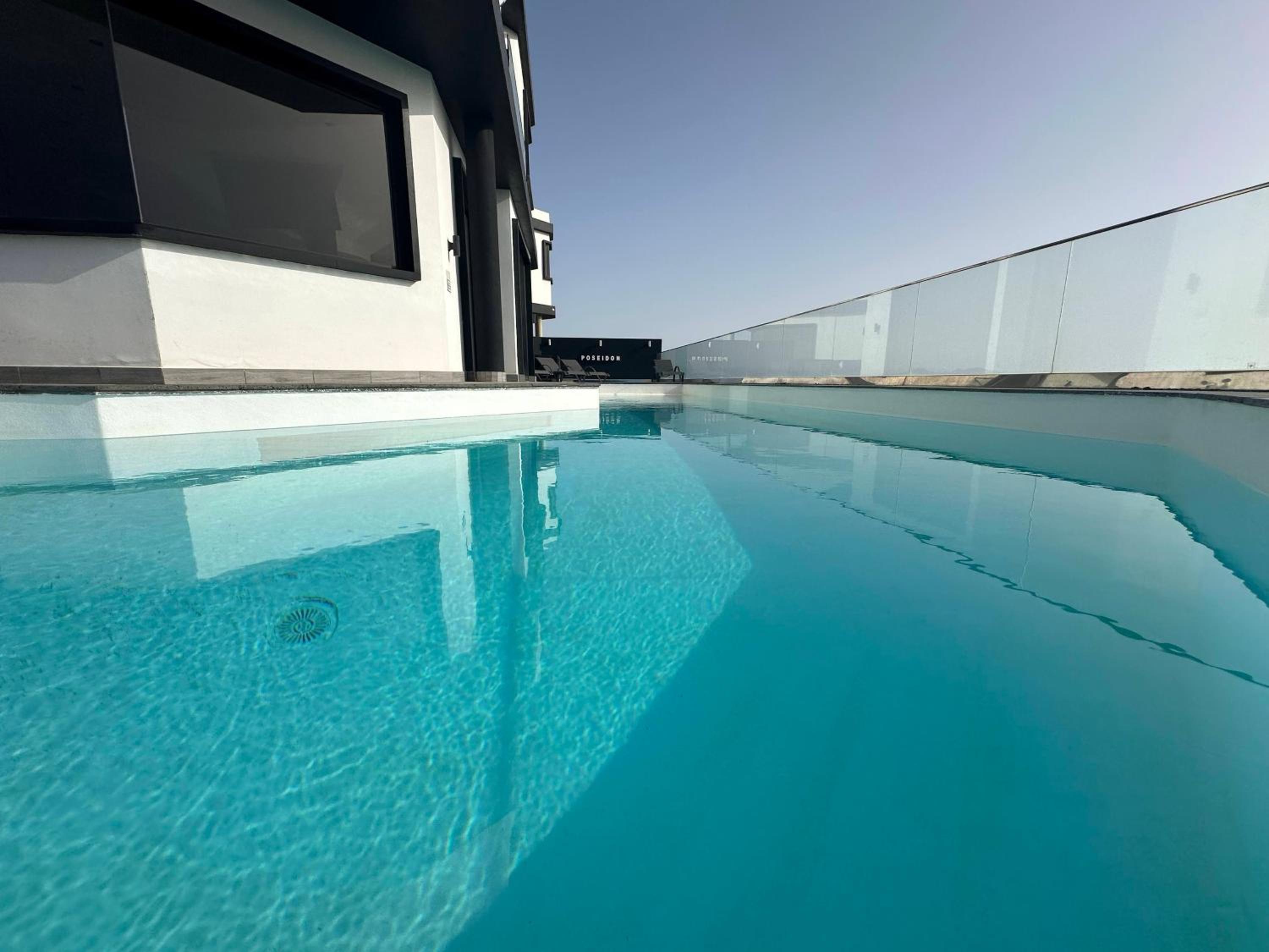 Villa Poseidon Corralejo with Private Heated Pool, Jacuzzi, Sauna and Stunning Volcano Views by Amazzzing Travel