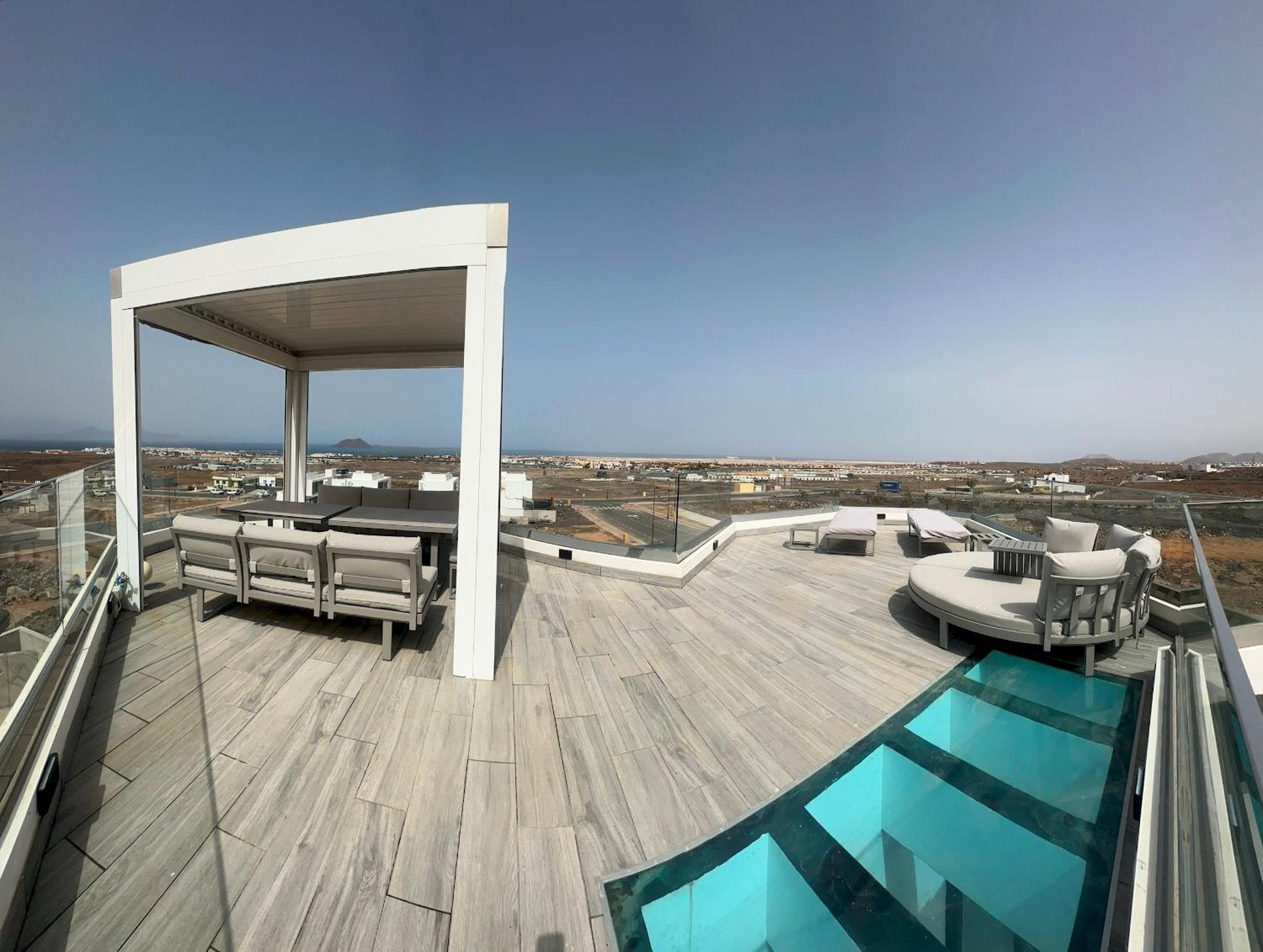 Villa Poseidon Corralejo with Private Heated Pool, Jacuzzi, Sauna and Stunning Volcano Views by Amazzzing Travel