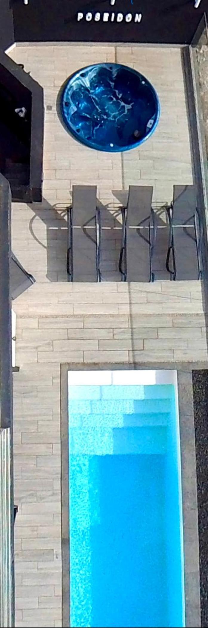 Villa Poseidon Corralejo with Private Heated Pool, Jacuzzi, Sauna and Stunning Volcano Views by Amazzzing Travel