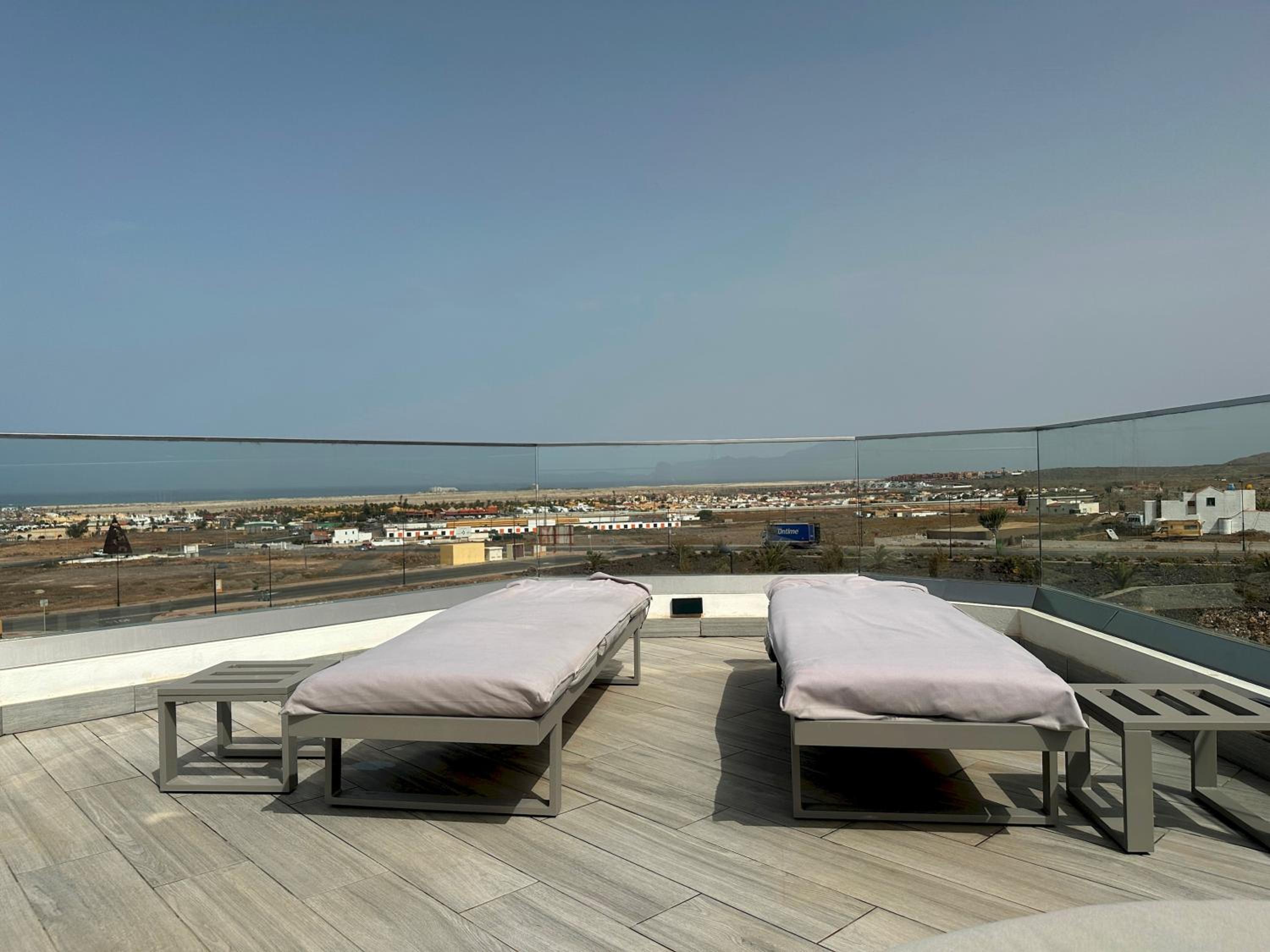 Villa Poseidon Corralejo with Private Heated Pool, Jacuzzi, Sauna and Stunning Volcano Views by Amazzzing Travel