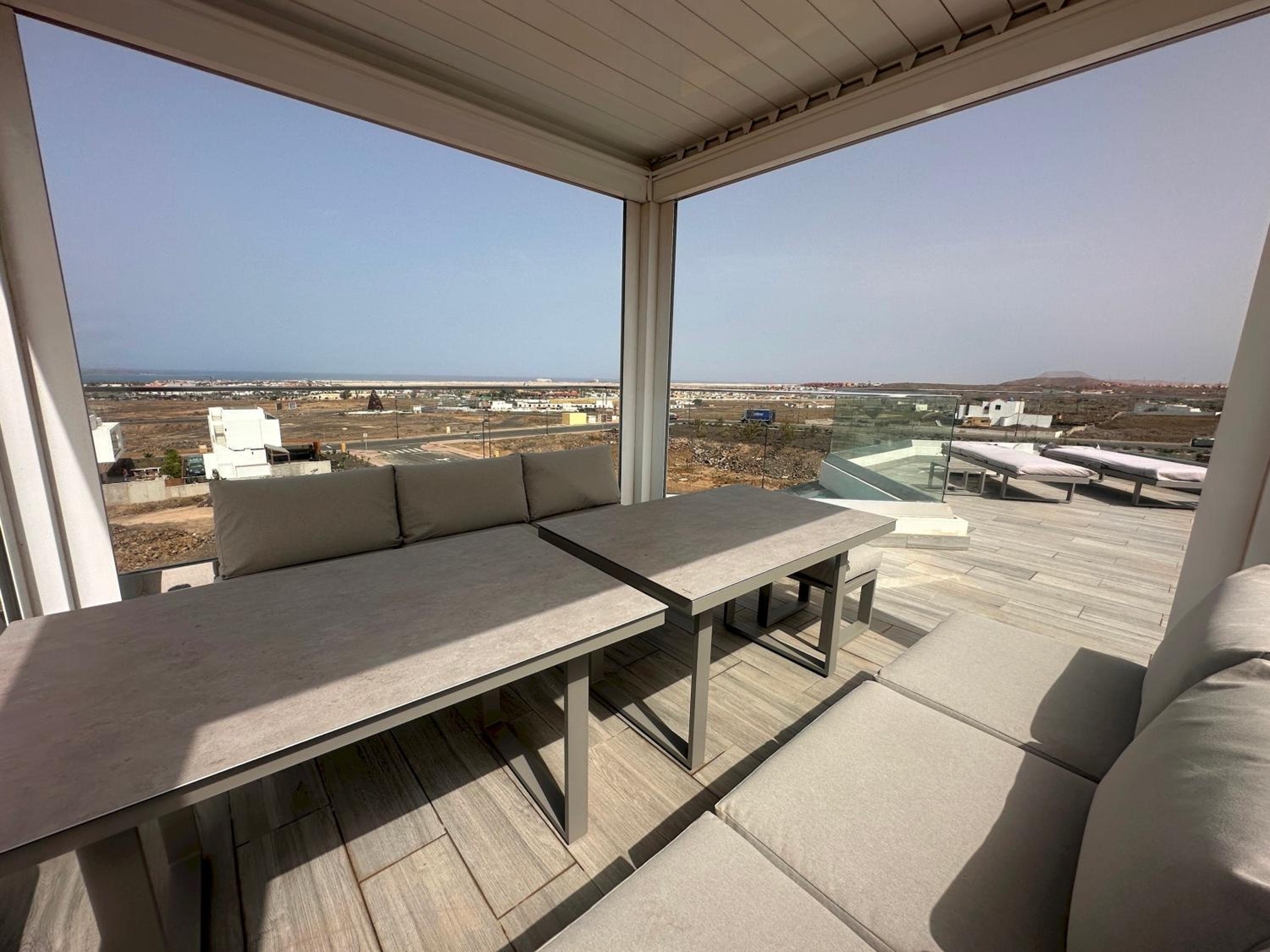 Villa Poseidon Corralejo with Private Heated Pool, Jacuzzi, Sauna and Stunning Volcano Views by Amazzzing Travel