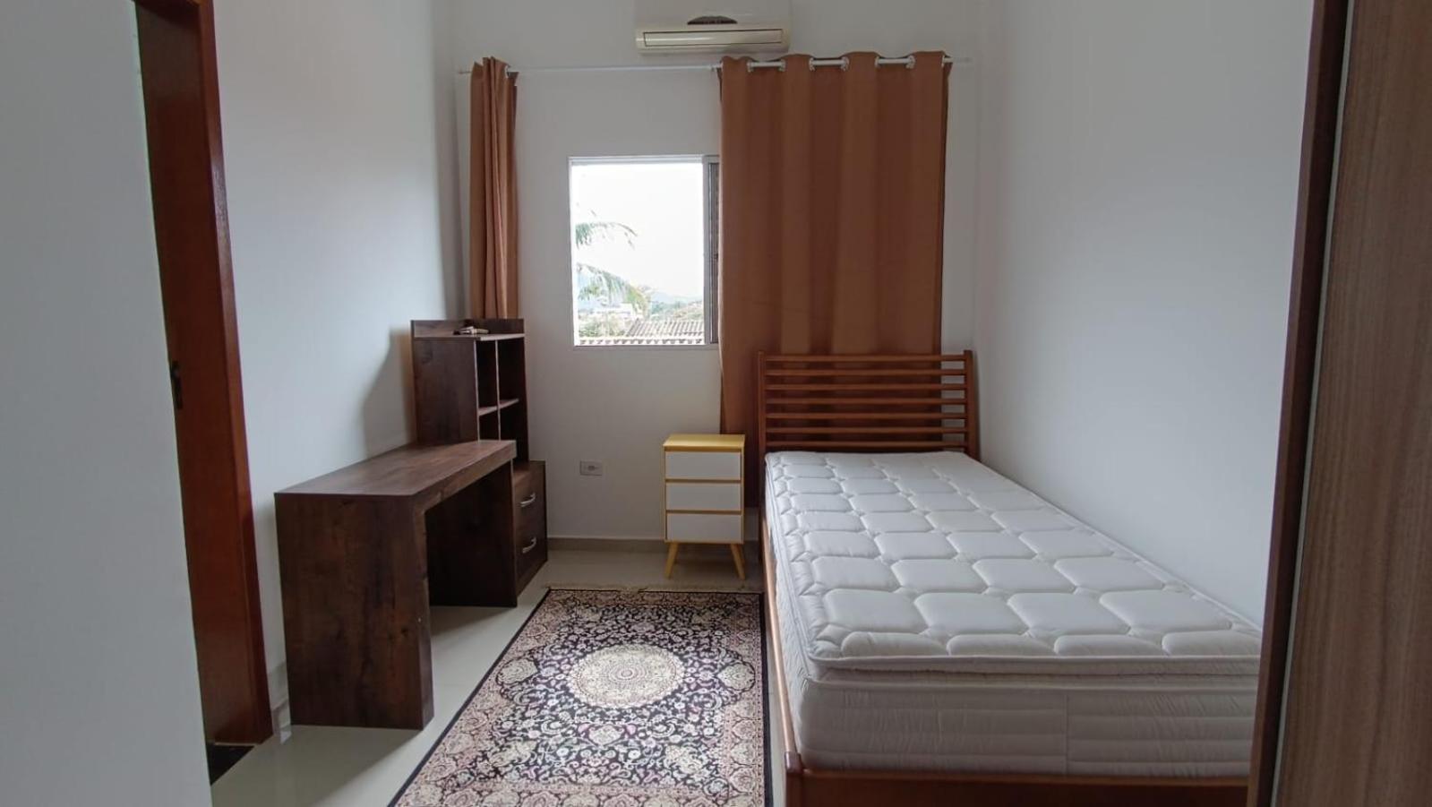 Casa Caragua Sobrado com 2 Suítes