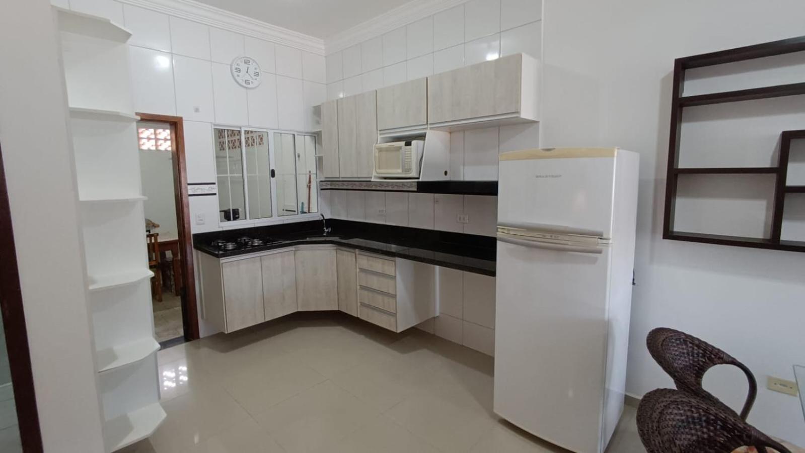 Casa Caragua Sobrado com 2 Suítes