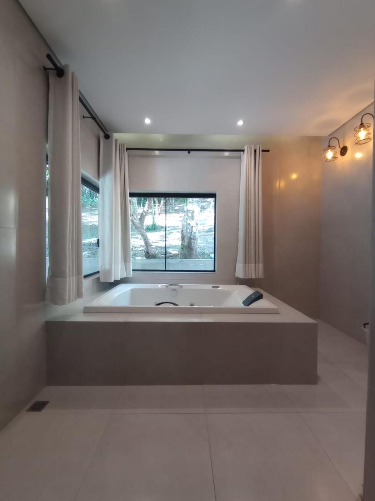 Cabanas Privativas com Jacuzzi, Cozinha, Churrasqueira e Decoração - Sitio Pauletto