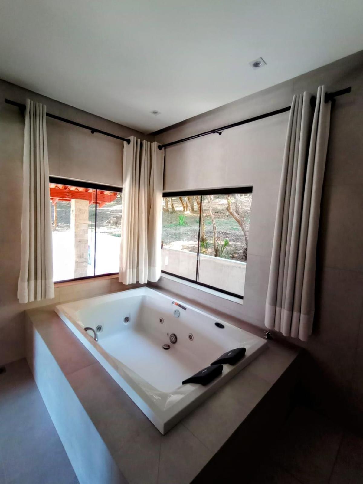 Cabanas Privativas com Jacuzzi, Cozinha, Churrasqueira e Decoração - Sitio Pauletto