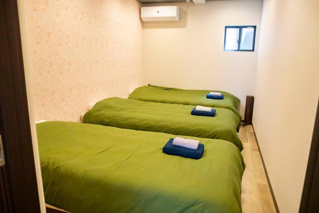 5 mins walk from Tengachaya stay Close to Namba