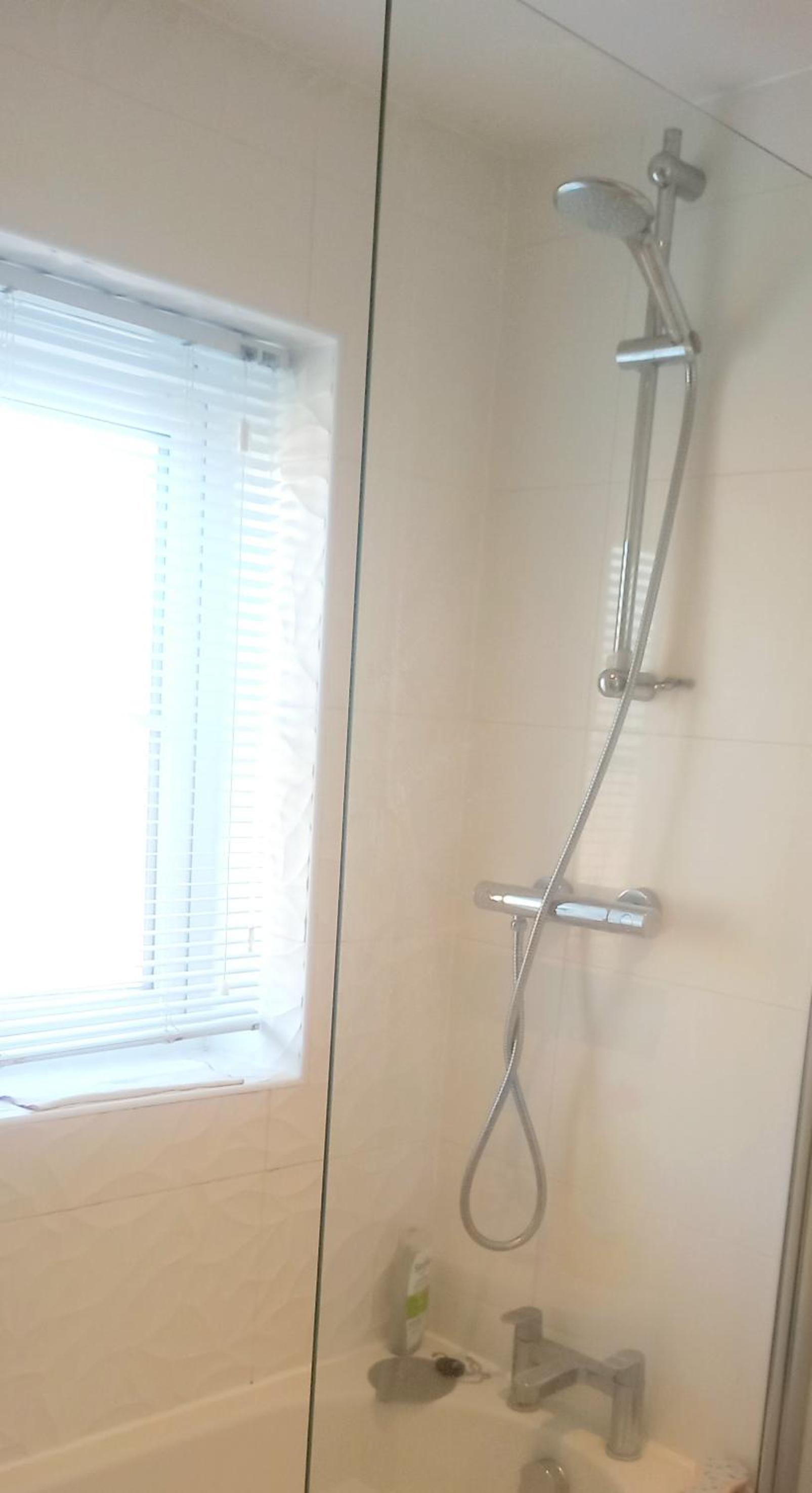 Cosy double bedroom in newly built house view 5