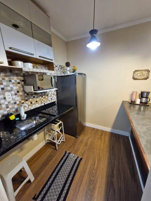 Flat Reformado à 350m da praia, com piscina
