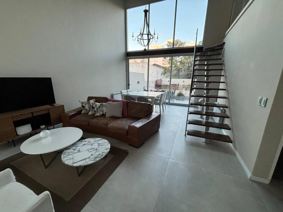 Modern Two-story House with Terrace in Nuñez River