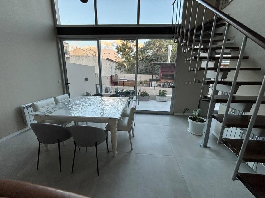 Modern Two-story House with Terrace in Nuñez River