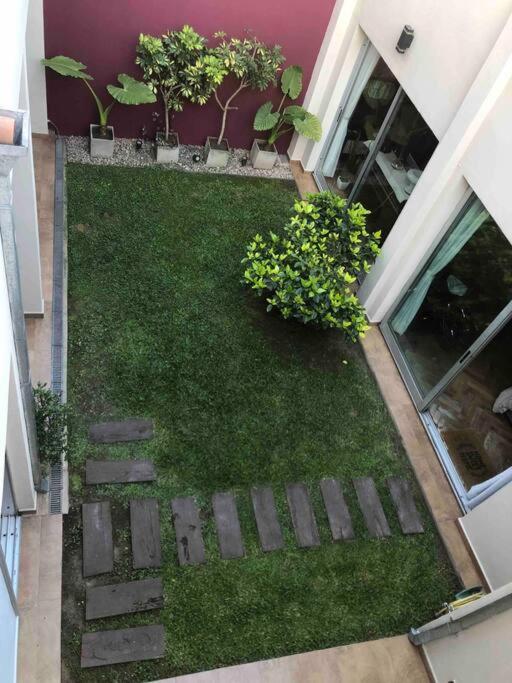 Modern Two-story House with Terrace in Nuñez River