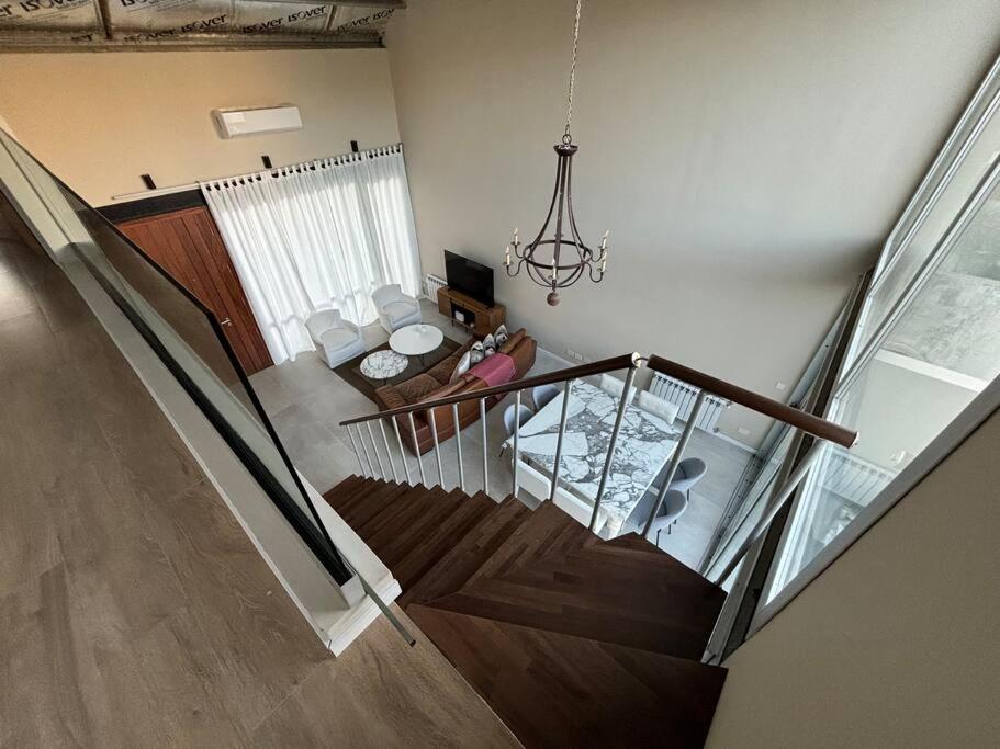 Modern Two-story House with Terrace in Nuñez River