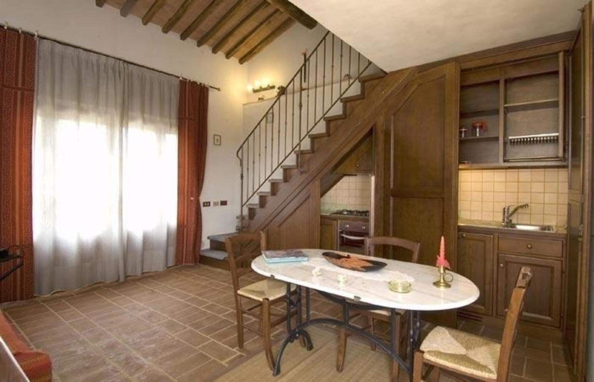 Wohnung in Asciano mit Grill und Garten