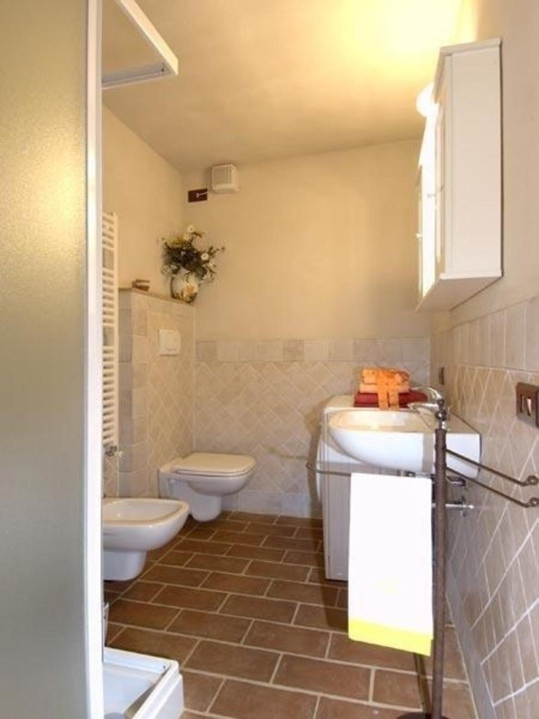 Wohnung in Asciano mit Grill und Garten
