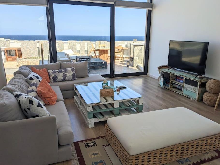 Splendid 2BR Seaview Getaway Free Pool & Beach access view 5