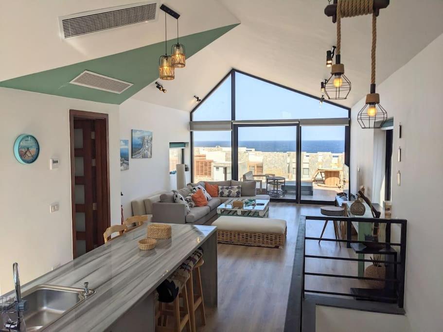 Splendid 2BR Seaview Getaway Free Pool & Beach access view 2