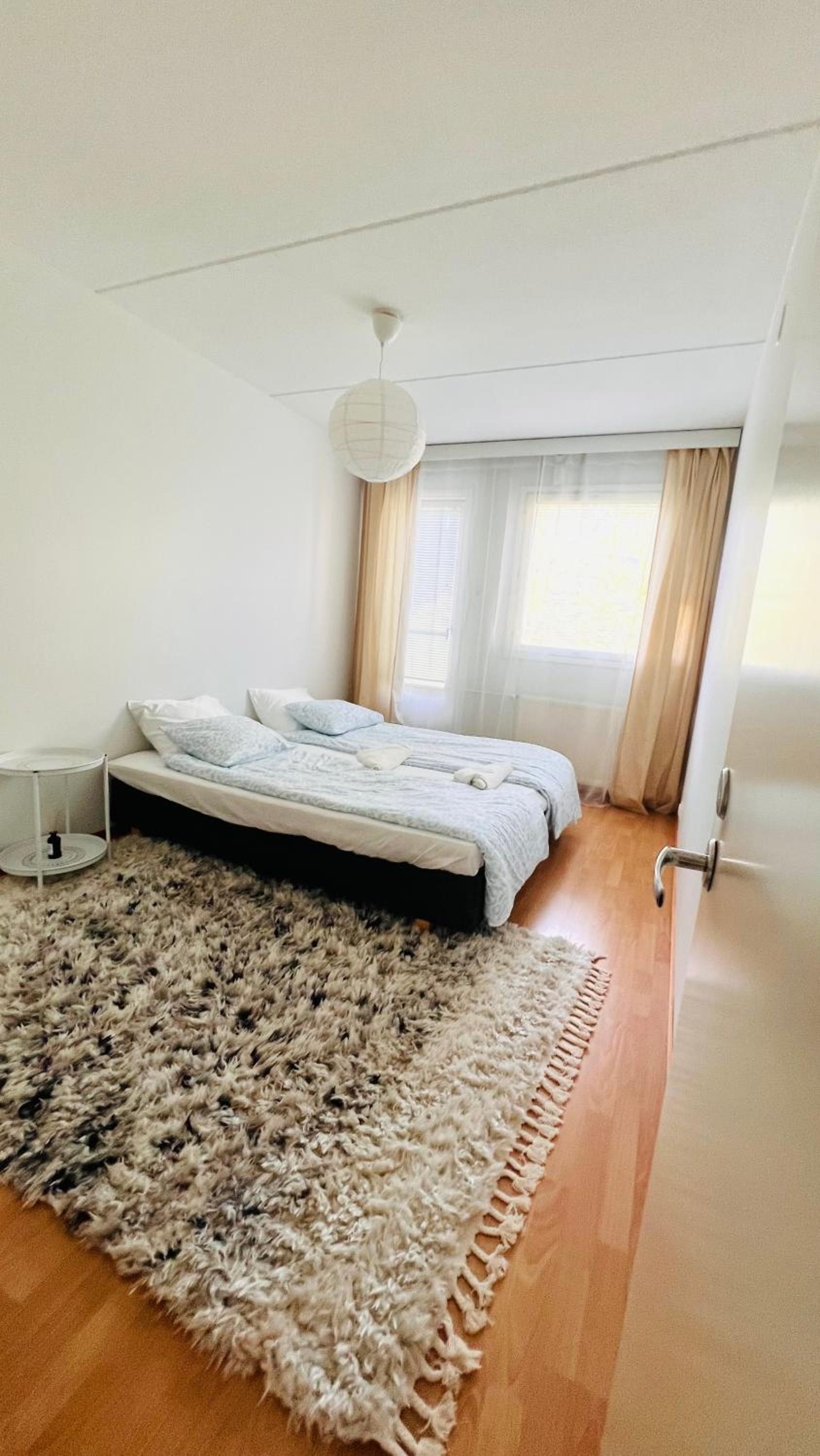 Spacious 2BR City Retreat with Private Sauna