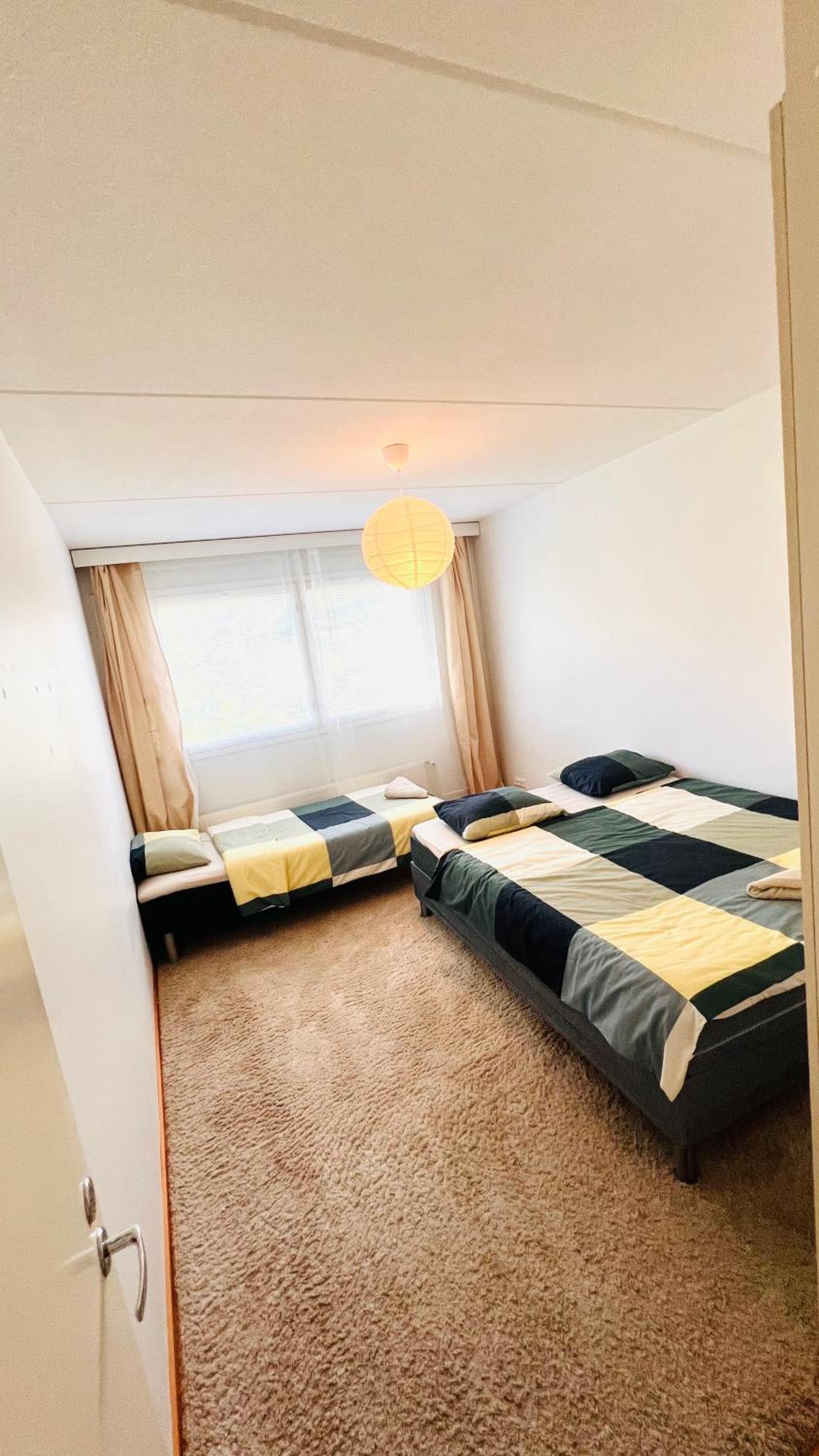 Spacious 2BR City Retreat with Private Sauna