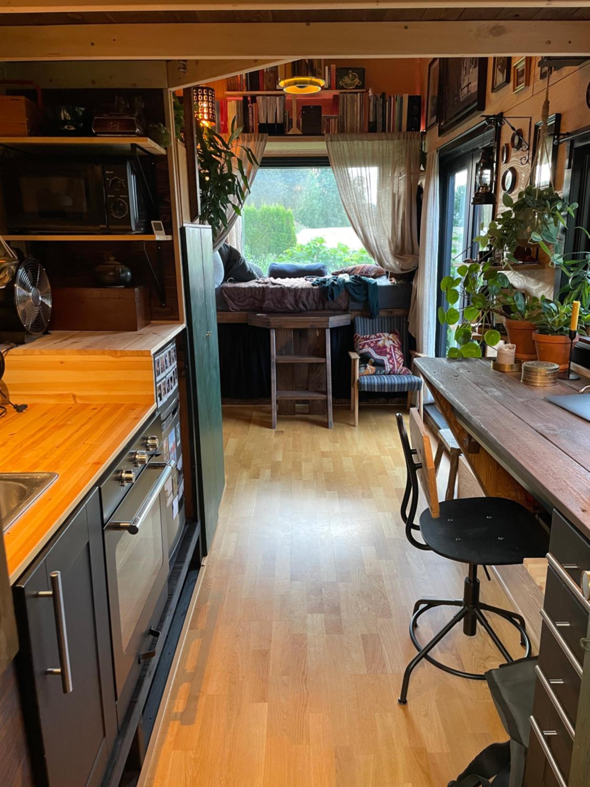 Stunning tiny house in beautiful garden view 4