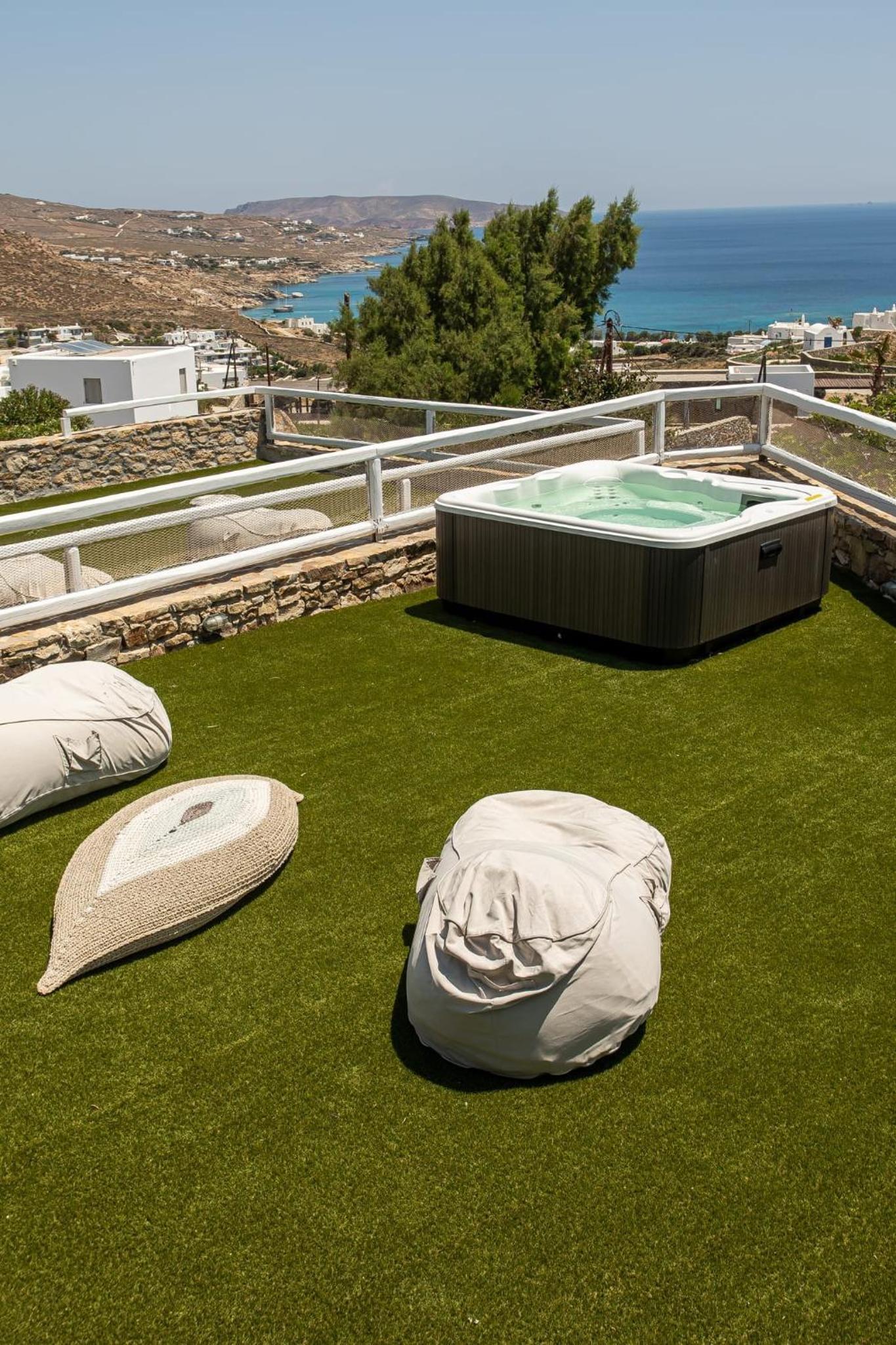 Magnificent Mykonos Apartment | Apartment Nexus | 2 Bedrooms | Private Terrace with Jacuzzi | Outdoor Dining Area & BBQ | Kalafatis view 4
