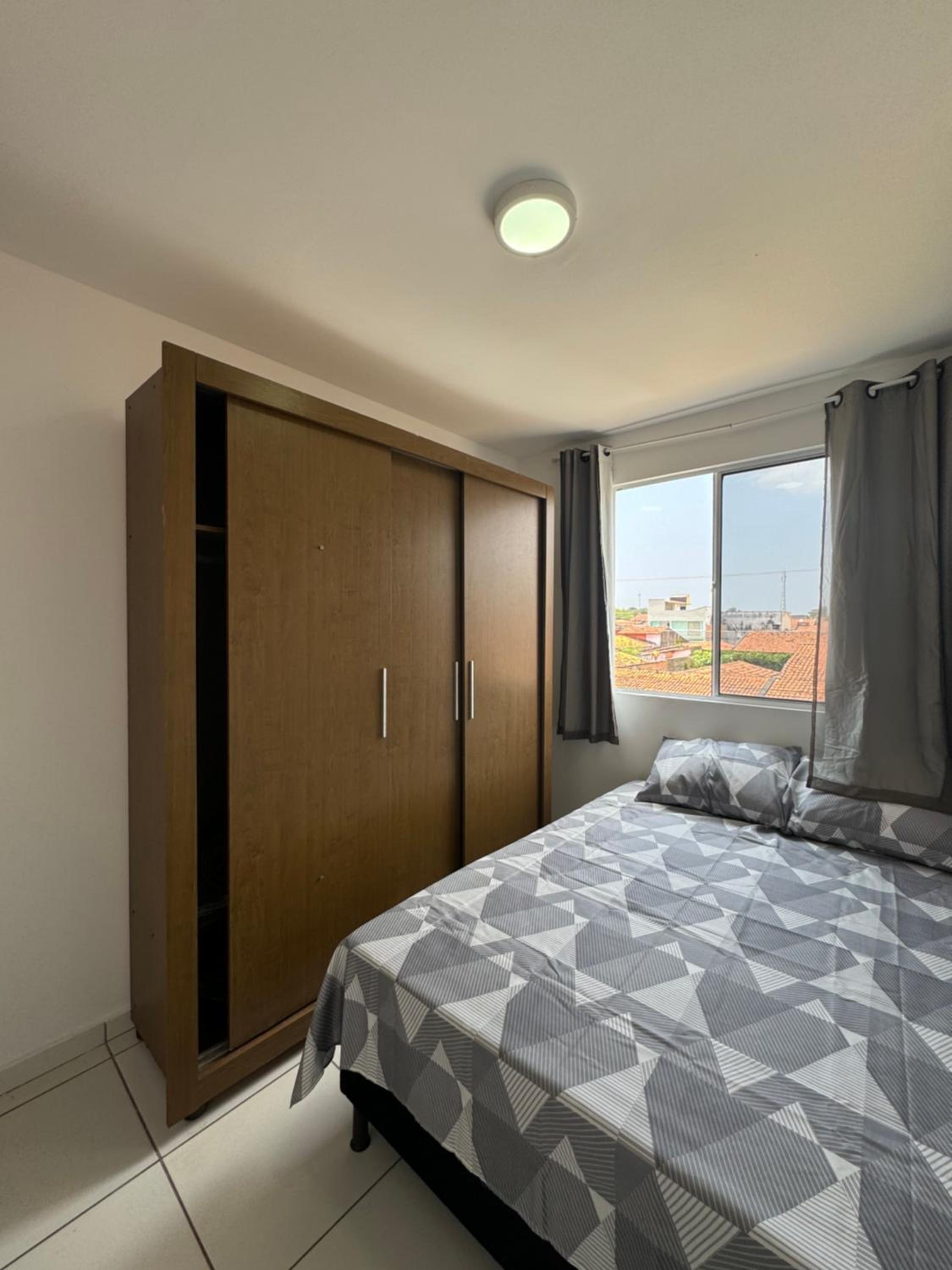 Apto com elevador, muito ventilado e aconchegante