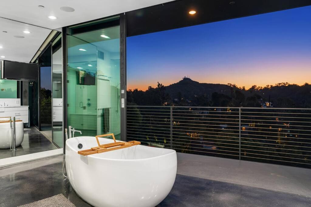 Luxurious Glass Mansion with Pool, Jacuzzi, Sauna
