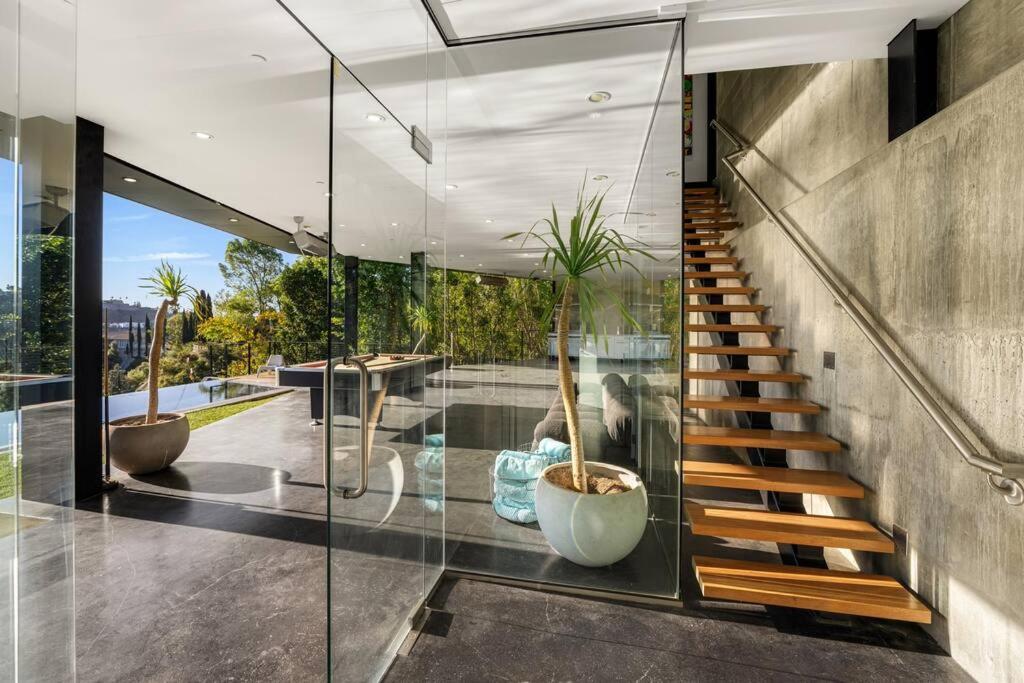 Luxurious Glass Mansion with Pool, Jacuzzi, Sauna