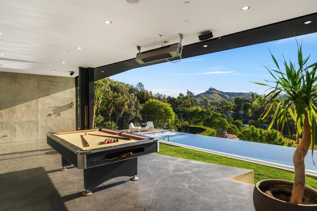 Luxurious Glass Mansion with Pool, Jacuzzi, Sauna