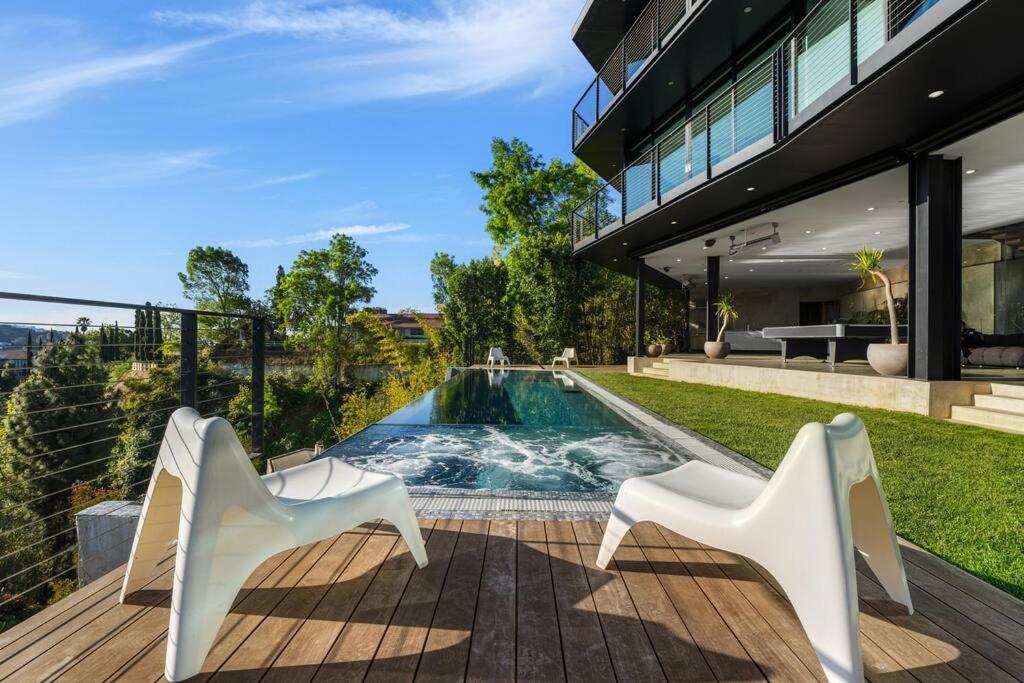 Luxurious Glass Mansion with Pool, Jacuzzi, Sauna