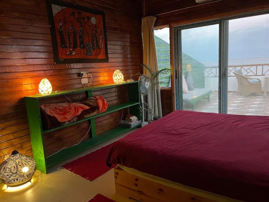 Beach front studio with huge roof top terrace