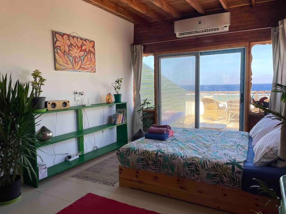 Beach front studio with huge roof top terrace