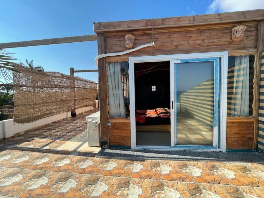 Beach front studio with huge roof top terrace