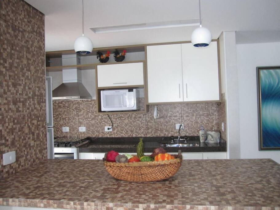 Apartamento em frente à Praia Grande - Luxo