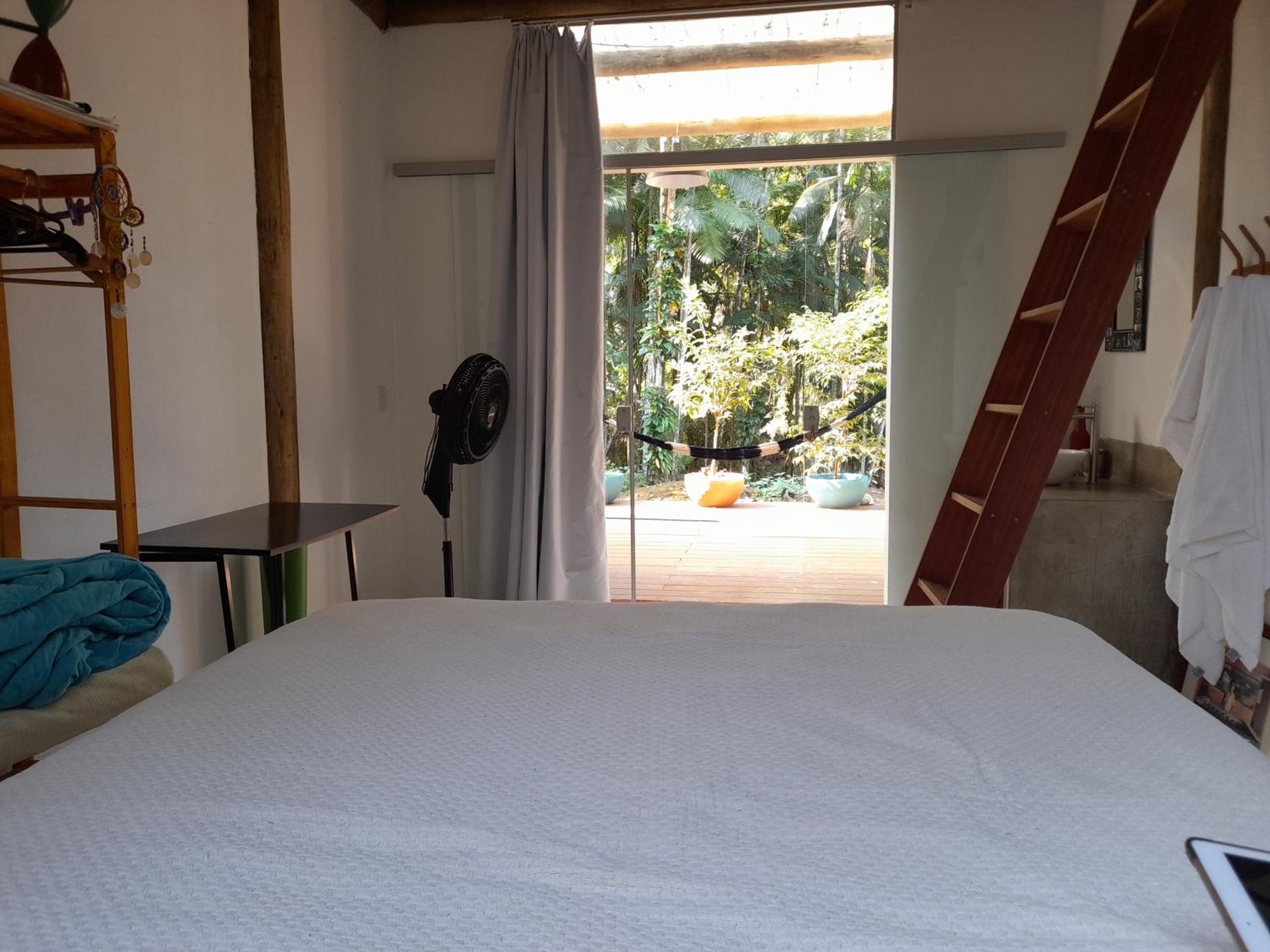 Quartos em sítio exuberante
