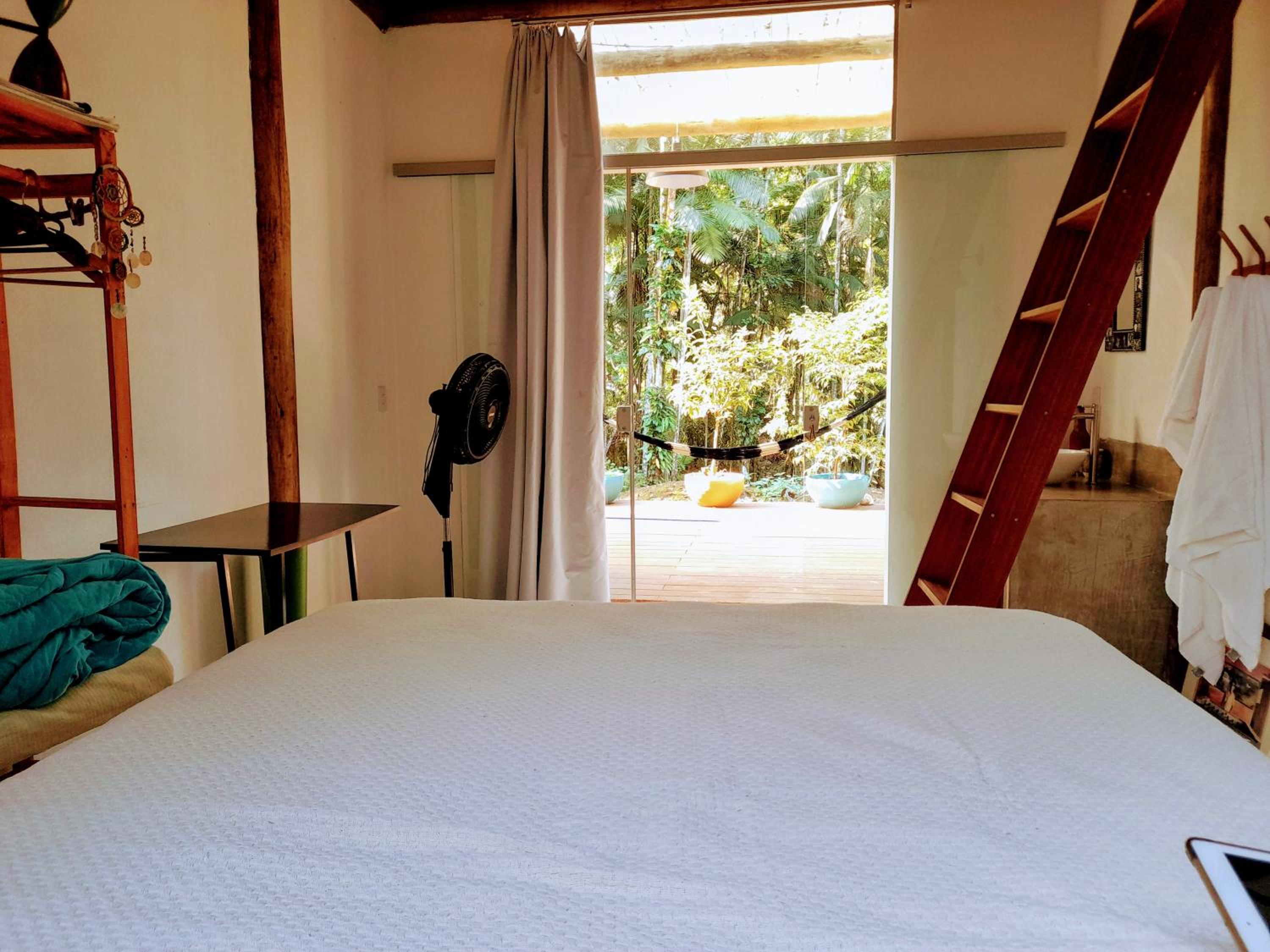 Quartos em sítio exuberante