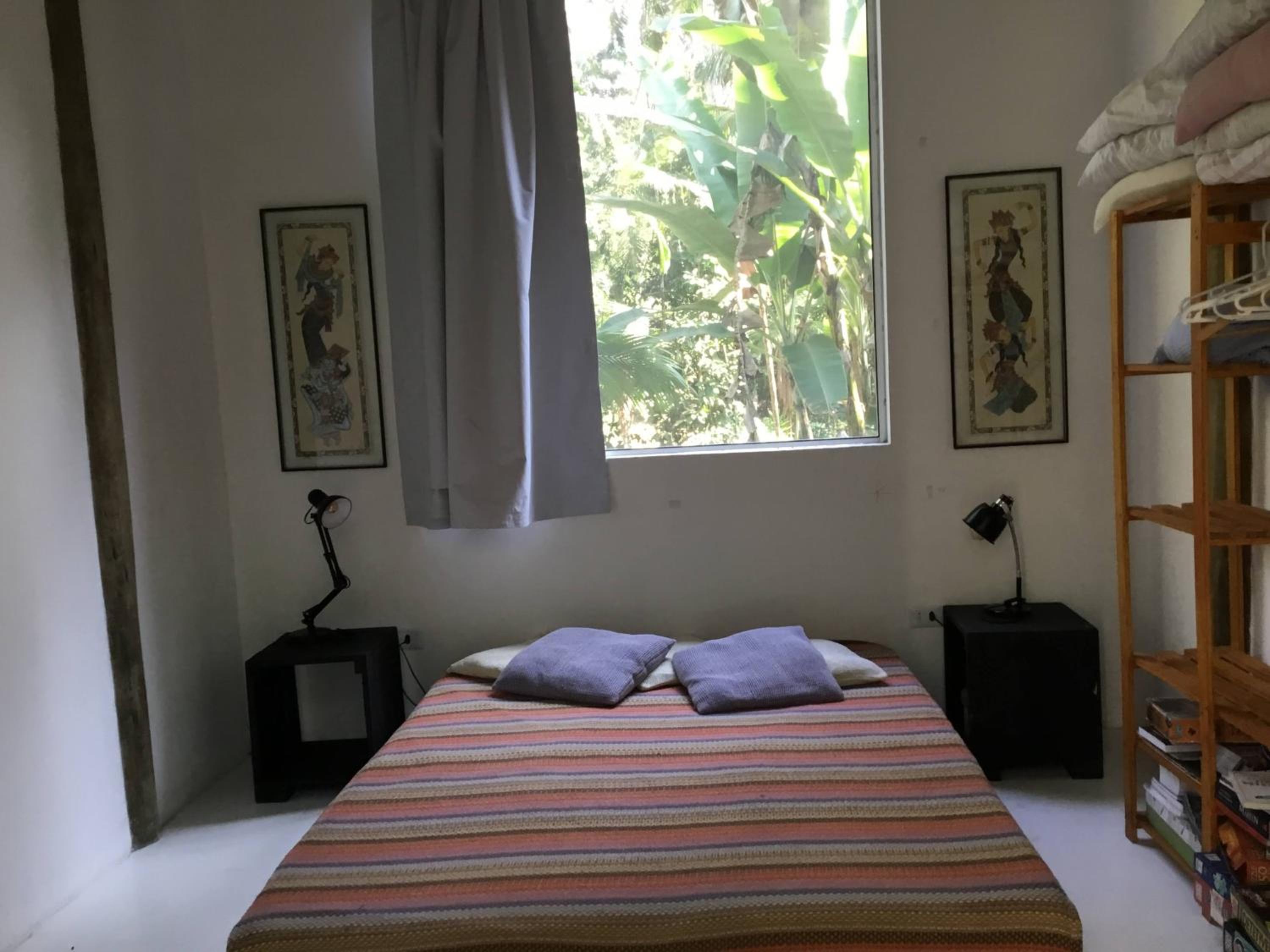 Quartos em sítio exuberante