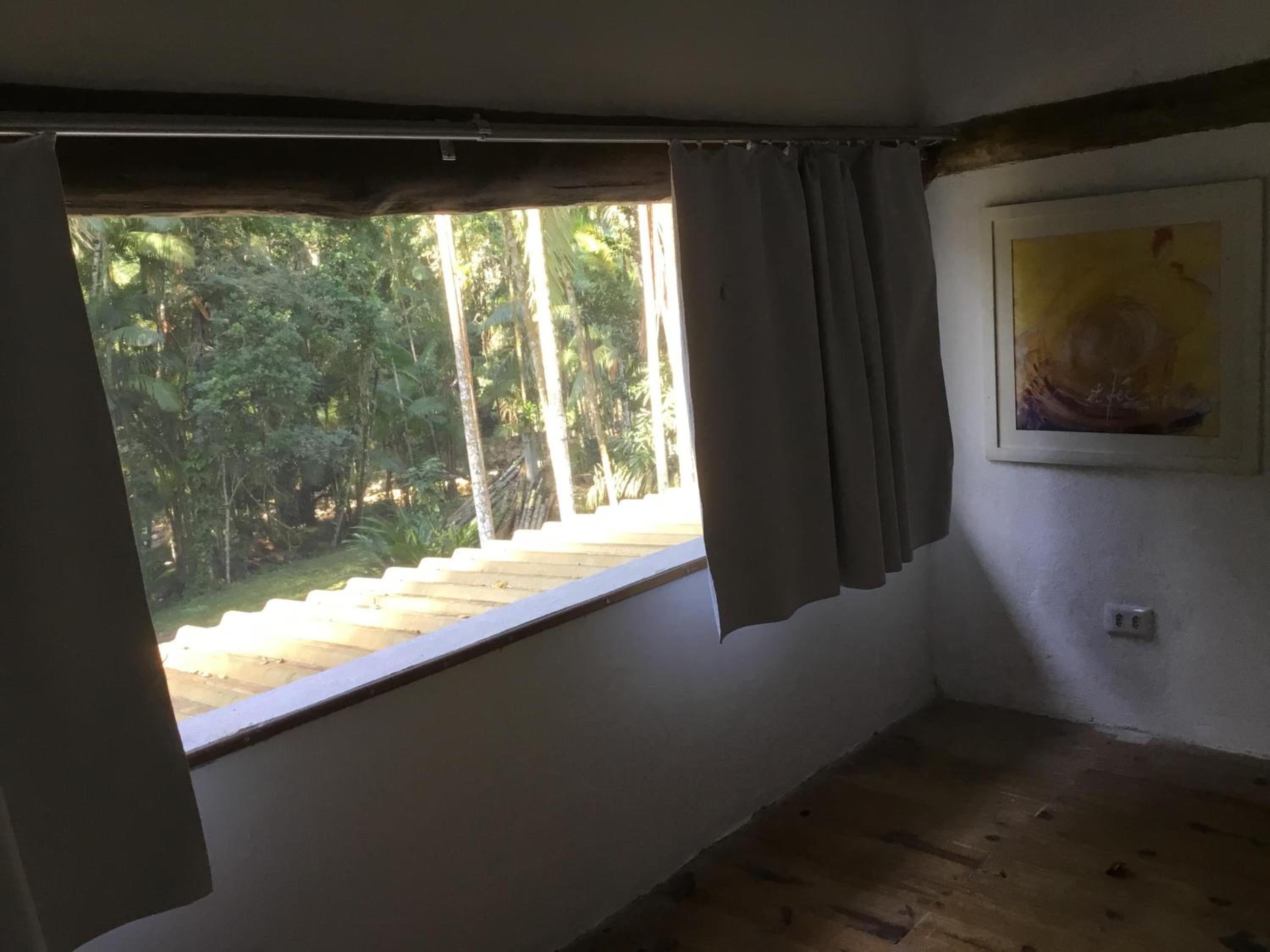 Quartos em sítio exuberante