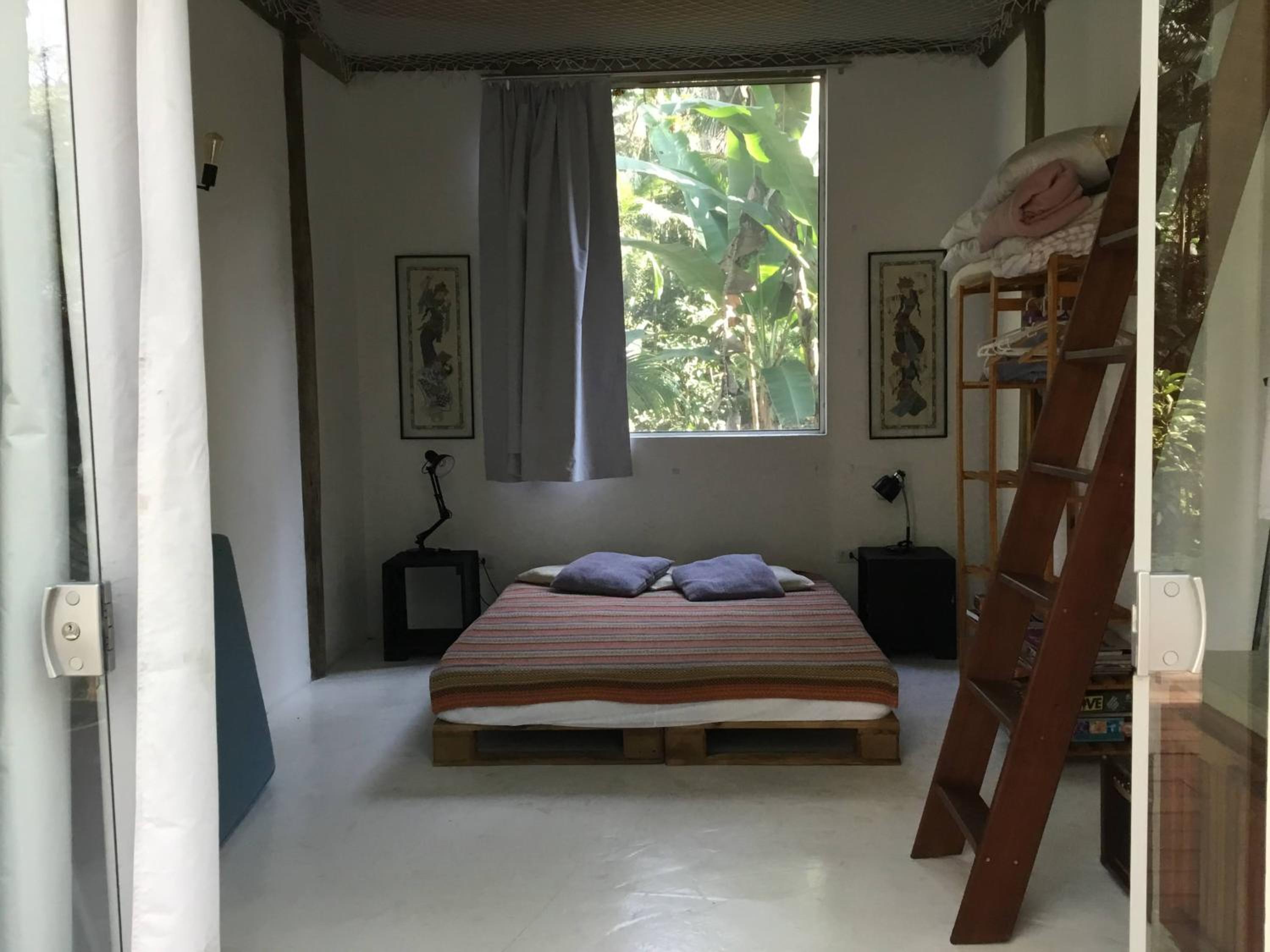 Quartos em sítio exuberante
