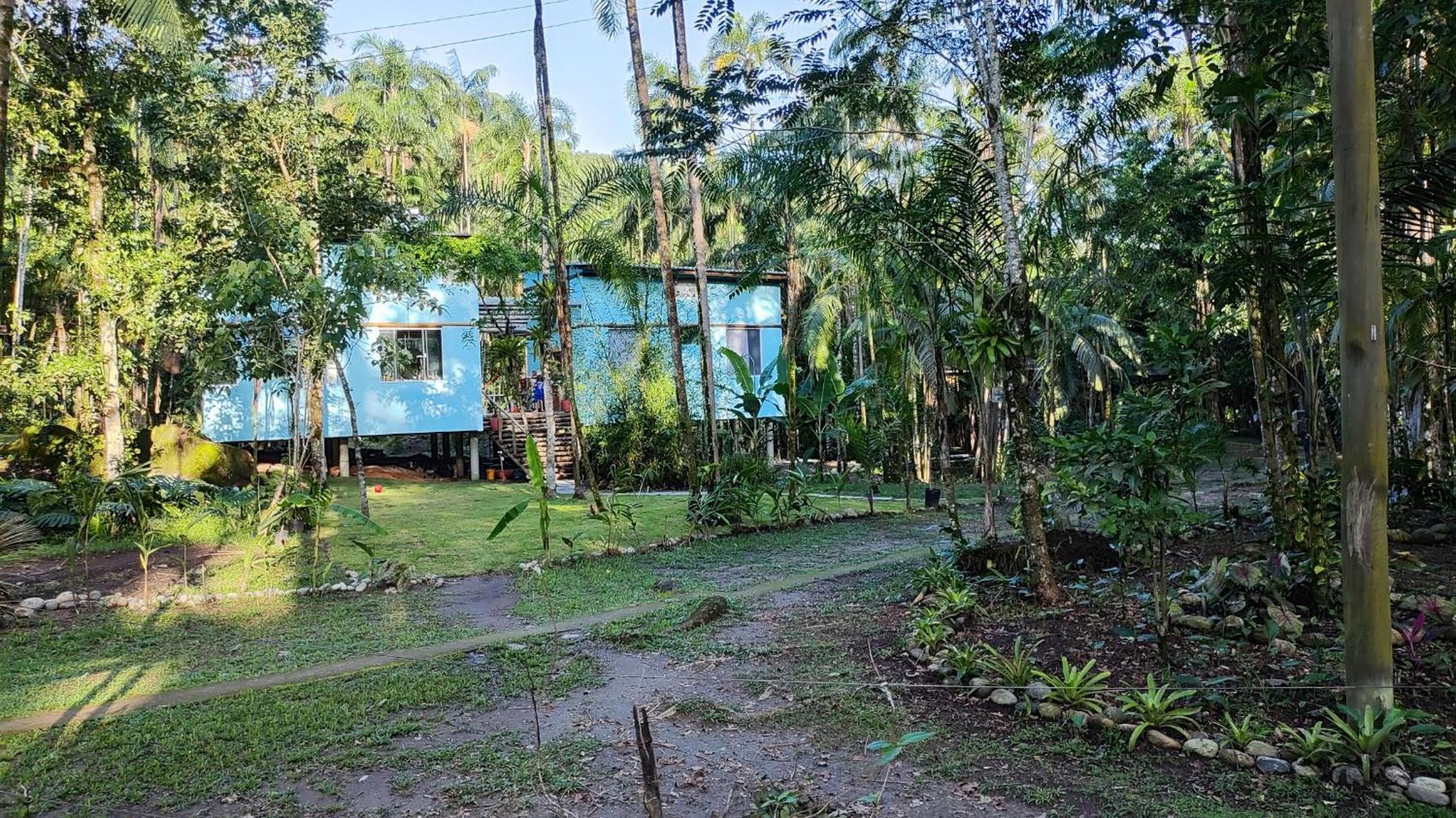 Quartos em sítio exuberante
