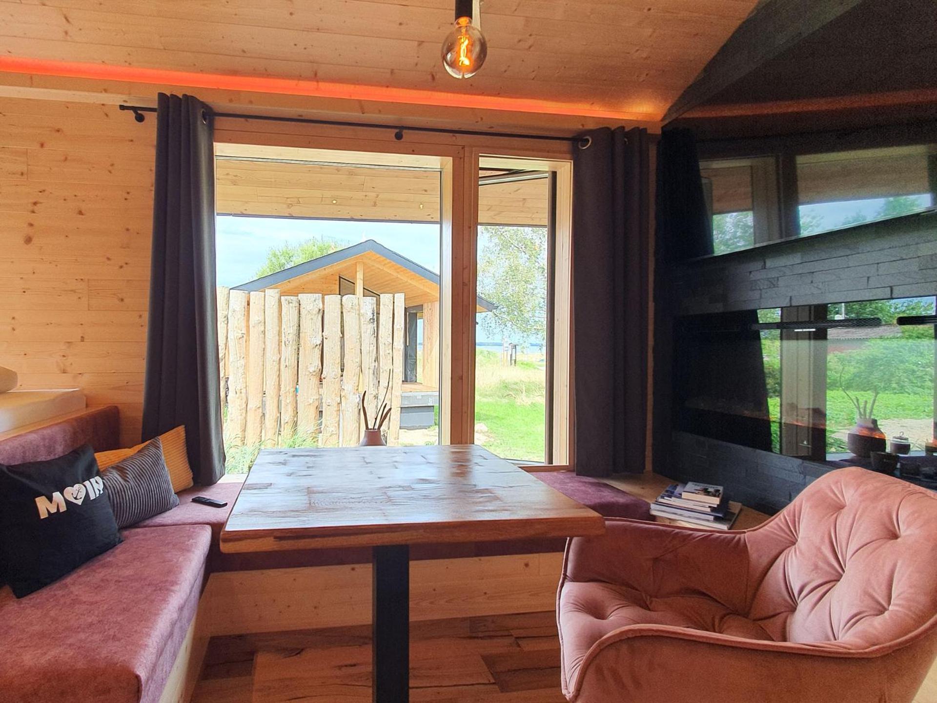 Werder Chalet -- COZYKOJE -- Ostsee Strand 150m I Sauna I eKamin I Tiny House mit Meerblick I 2 Pers und Kind I by 