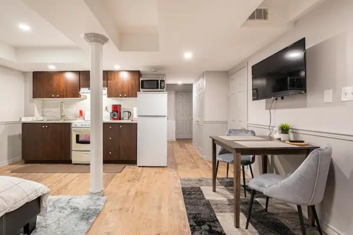 Modern, basement apartment, close to airport