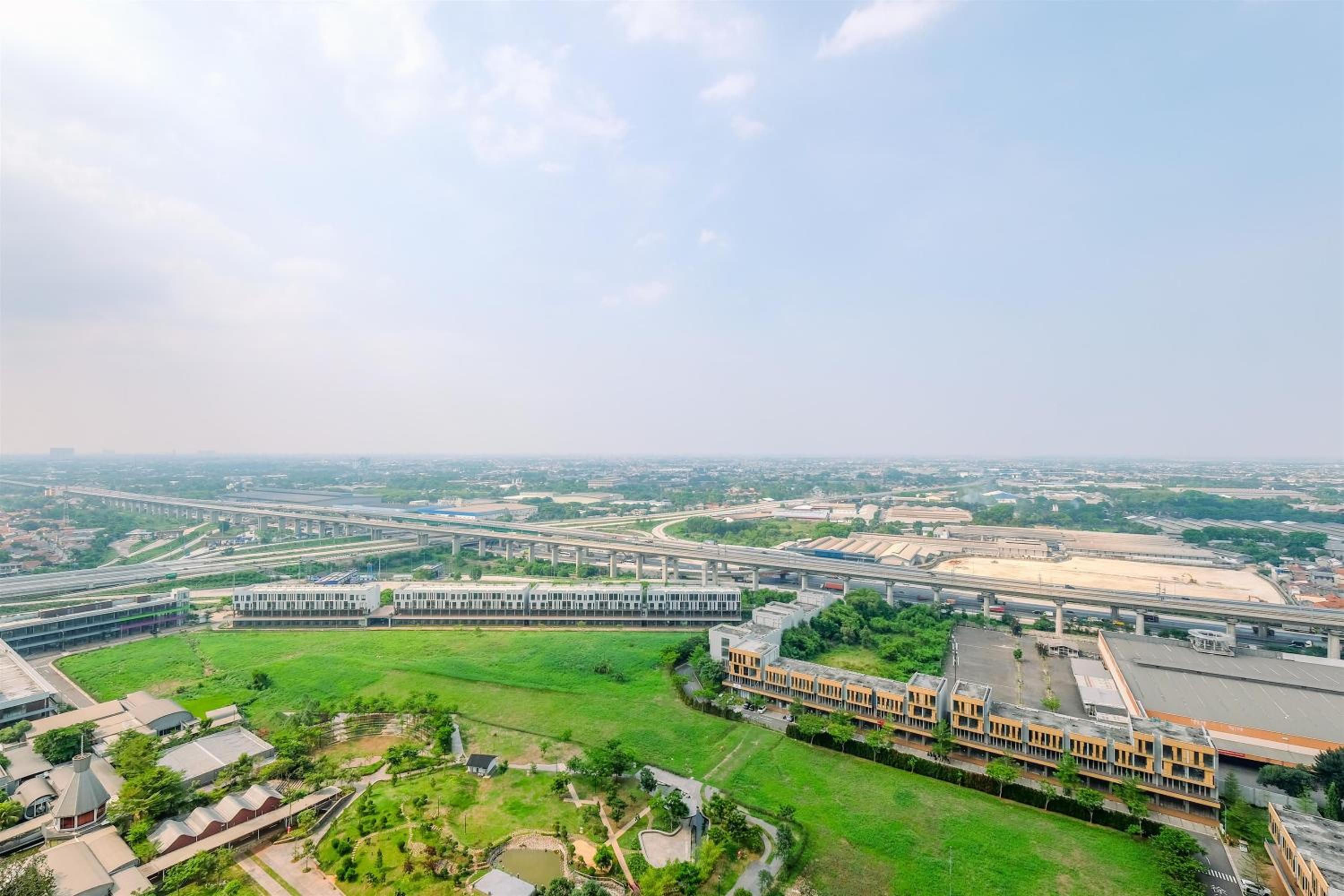 Homey and Comfort Stay 1BR Vasanta Innopark Apartment By Travelio view 3