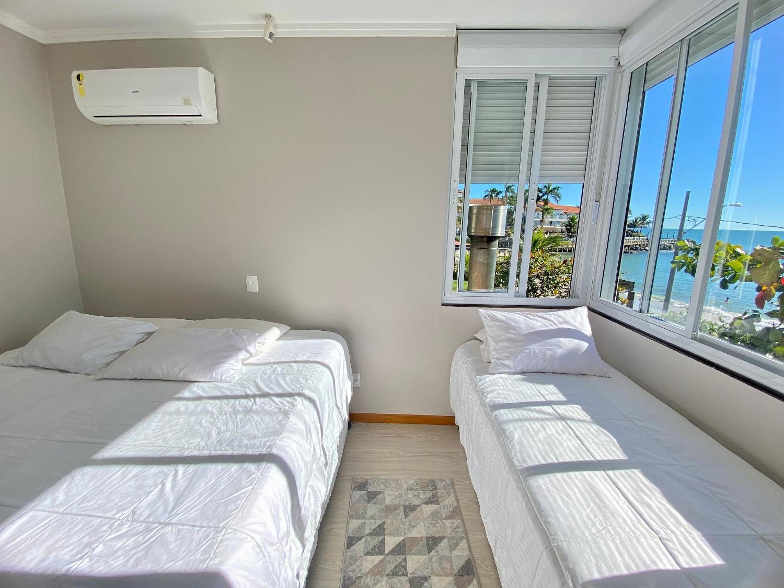 415 - Casa frente mar para alugar Bombinhas com 4 suítes